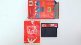 Screenshot på Game Genie (inkl. Kodbok & Amerikansk Version)